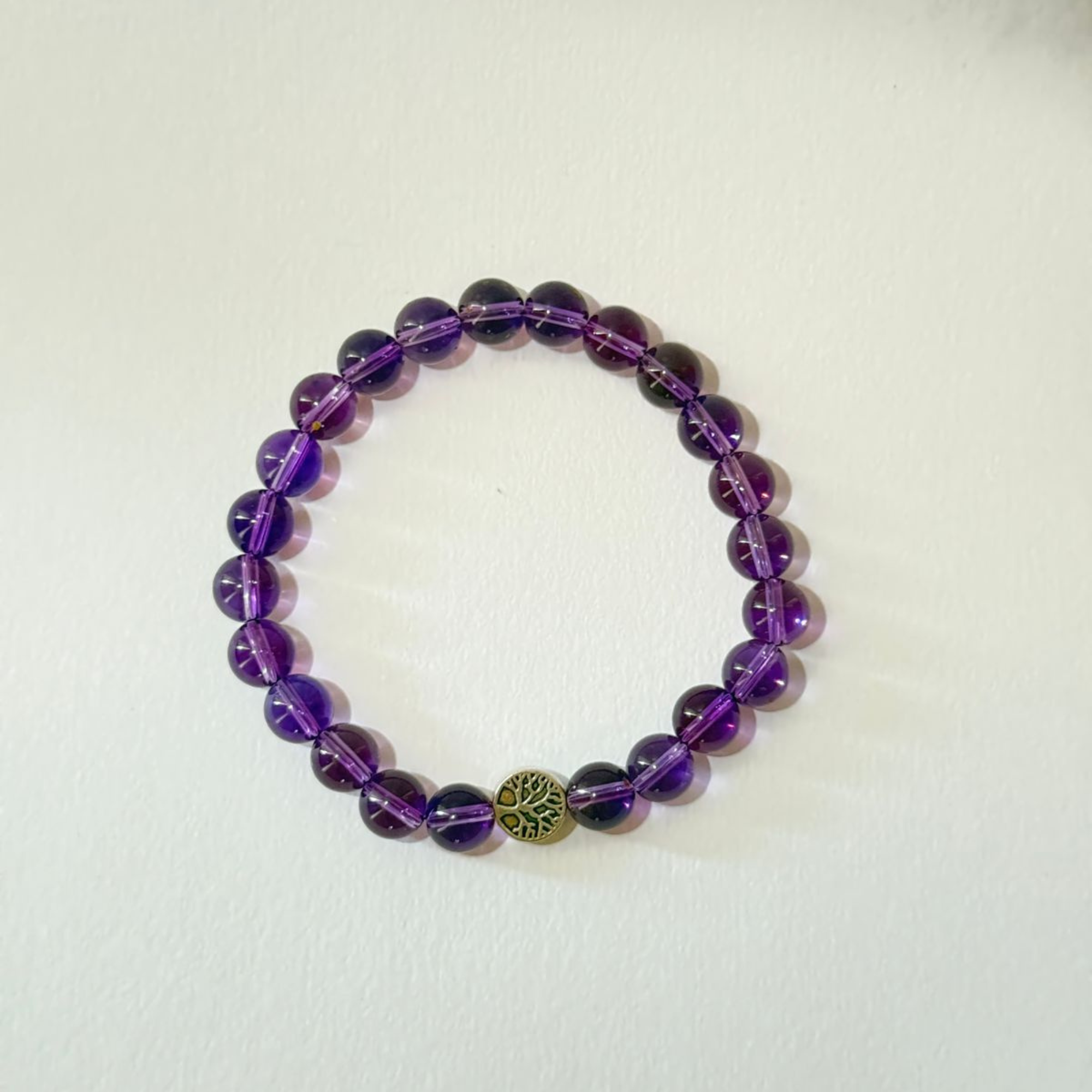 Uruguay Amethyst Bracelet for aura protection, mind clarity, inner vision, spiritual healing, emotional balance, and deep transformation infused with Star Codes.
